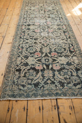 Distressed Mahal runner with charcoal Herati motif on antique ivory, featuring soft blush accents.
