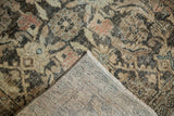 Vintage distressed Mahal runner corner reveals worn Herati pile and hand-knotted foundation.