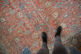 Personal view of a distressed Bijar carpet highlighting its even wear and soft palmette pattern.