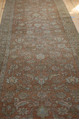 Distressed Northwest Persian runner, textured dusty brick terra cotta floral and serrated leaf motif.
