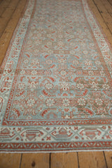 Distressed texture and even wear on vintage Hamadan runner's pale blue, ivory, terracotta Herati pattern.