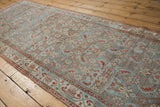Distressed Hamadan runner with dusty blue, ivory, and red Herati motif and classic Serabend border.