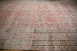 Close view of mostly even wear down to the knot heads on a distressed antique Kermanshah carpet.