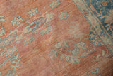 Distressed Mahal carpet with even wear, abrashed terra cotta, and dusty blue florals.