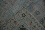 Distressed Persian Doroksh carpet's folded corner, showing worn field, exposed foundation, and intact selvage.