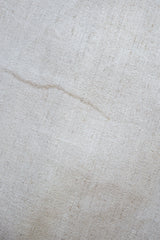 Hand-woven Turkish flatweave with nuanced ivory, platinum, and silver speckled character.