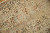Faded sandalwood, ivory, and beige vinery motifs on a distressed Turkish Sparta carpet.