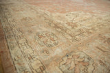 Distressed vintage Sparta carpet's worn pile with delicate vinery and floral cross-sections.