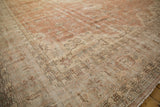 Sparta carpet corner, geometric border, distressed sandalwood field showing foundation wear.