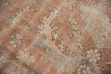 Distressed field with serrated leaves, delicate vinery, and sandalwood, beige, silver tones.