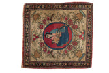 Antique Persian Isfahan rug with a pictorial mother and child medallion on a floral ivory field.