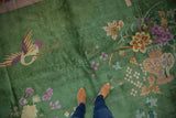 Emerald green vintage Art Deco carpet, pictorial garden scene with Phoenix, lotus, and textured pile.