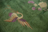 Art Deco carpet featuring pictorial Phoenix and lotus flowers on emerald green.