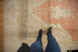 Textured pile, abrashed field, and unusual prayer motif on vintage Turkish Oushak rug.