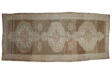 Distressed vintage Oushak carpet with abrashed triple medallions, beige and sand tones, 8x18.