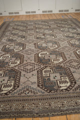 Distressed geometric guls and diamond motifs featuring even wear in muted silver, charcoal, and ivory.