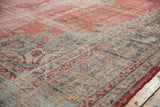 Distressed vintage Oushak carpet border, with pale red and oxidized silver serrated leaf motifs.