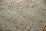 Distressed pile texture with delicate scrolling tendrils in ivory and coffee brown shades.