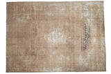 Distressed vintage Kashan rug, textured neutral pile, faded motifs, and a navy stripe.