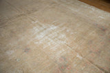 Textural vintage distressed Kashan carpet, showing foundation wear and subtle faded patterns.