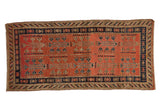 Vintage Khotan runner, tomato red field, geometric tree of life, navy crab border.