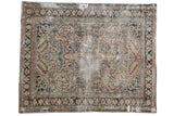 Distressed vintage Dargezine carpet with dusty rose floral field and navy blue borders, 5'4