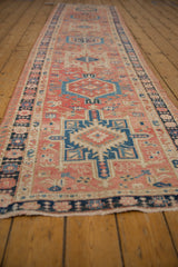 Heavily abrashed blush and navy Karaja runner with geometric floral and boteh motifs.