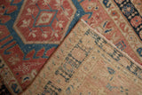 Hand-knotted reverse and worn geometric blush and navy pile of Karaja runner.