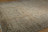 Distressed Karaja carpet corner, featuring geometric palmette guls and textured chocolate border.