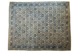Distressed vintage Oushak carpet, allover floral lattice design, antique ivory and cobalt blue.