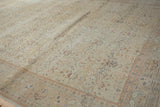 Distressed Kayseri carpet detail: faded floral field, boteh border, ivory, blush, blue tones.
