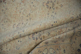 Distressed vintage Kayseri carpet detail showing worn pile, pale ink blue floral motifs, and soft beige colors.