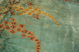 Sea foam green Art Deco rug detail: sprawling saffron, copper floral bouquets, delicate vinery.