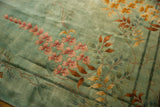 Delicate blush florals, copper vines, and bamboo stalks on a sea foam green Art Deco carpet.