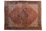 Vintage Mahal rug: sapphire diamond medallion, brick red floral field, Herati border.