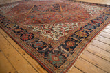 Vintage Mahal carpet corner, dark blue Herati border, shrimp-like leaves, brick red field.