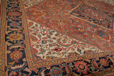 Vintage Mahal carpet detail: sapphire blue Herati border with brick red and ivory floral motifs.
