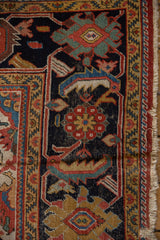 Intricate Herati border with shrimp-like leaves on a vintage Mahal carpet, showing fringe.