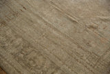 Vintage Distressed Oushak Carpet reverse, revealing foundation weave and faint processing numbers.