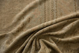 Close-up of distressed vintage Oushak rug pile with mostly even wear across to knot heads.
