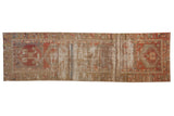 Distressed vintage Oushak rug runner, madder red hexagonal medallions, worn beige field, 2'10
