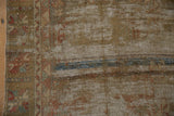 Textured, worn hand-knotted Oushak rug pile, revealing foundation and a blue stripe.