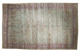 Distressed Persian Mahal carpet, 10x16, with muted seafoam green, raspberry, and floral vinery.