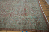 Distressed vintage Mahal carpet edge, worn dusty mauve and slate blue Herati pattern, fringe.