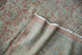 Distressed vintage Persian Mahal carpet pile, muted Herati pattern, ivory fringe.
