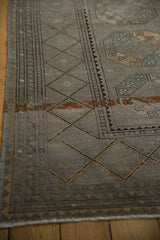 Distressed Ersari runner, highlighting chevron borders, diamond motifs, and pale, even wear.
