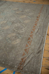 Distressed Ersari carpet runner, detailed with muted floral guls and copper chevron border.