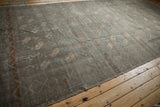 Distressed Ersari runner with floral guls, diamond vine border, in slate blue and pale copper.