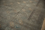 Distressed Ersari runner detail: faded guls with slate blue and dusty copper, charcoal borders.