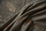 Distressed texture of the Ersari runner with dynamic tone-on-tone silver, charcoal, and copper abrashes.